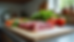 Eye-level view of plastic cutting board with raw meat and vegetables on kitchen counter