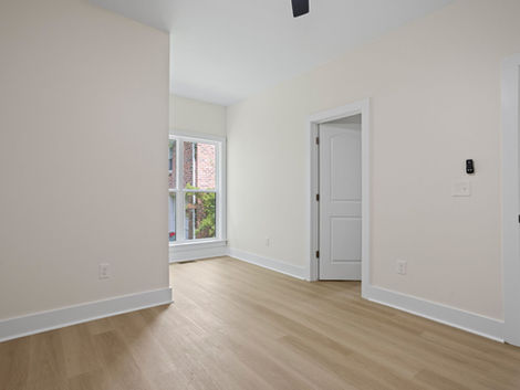 Finished interior room with wood flooring and trim at 9 Dahlgreen