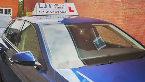 car with logo of business on