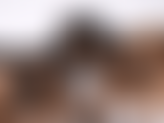 group of black women with curly textured hair smiling 