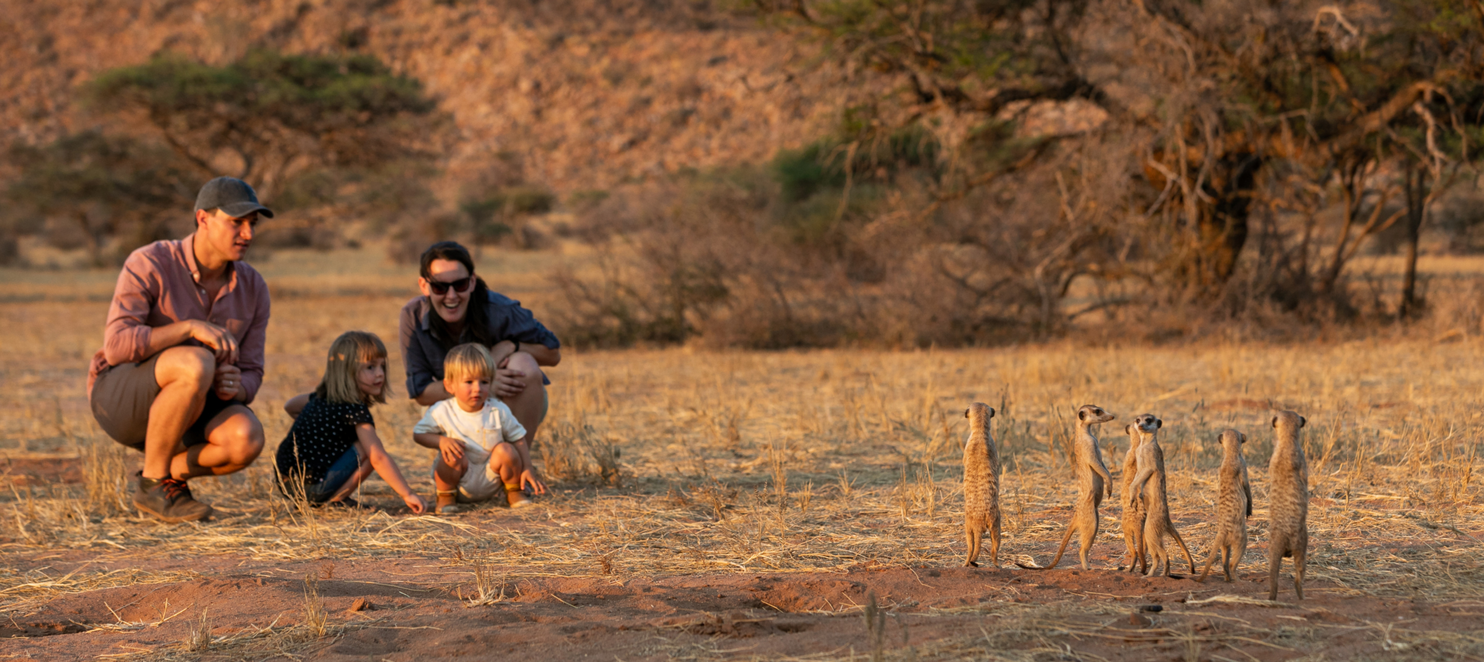 Family safari in Tswalu Kalahari Reserve experiencing the meerkats