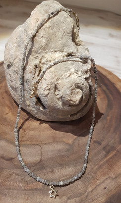 A string of diamonds, those wild diamonds that are not polished at all, in their very natural form, as collected from the ear
