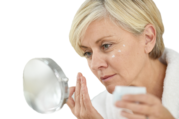 Woman Applying Face Cream_edited.png