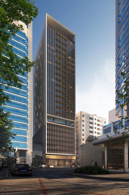 Modern residential tower in Sharjah Al Majaz with glass facade and golden fins, contemporary high-rise architecture by Architect Shabeeb Mohammed and Shape Architecture Practice.