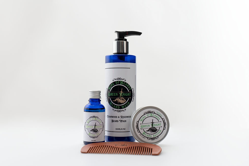 A beautiful set of royal blue beard products including, oil, shampoo, butter and a wooden comb