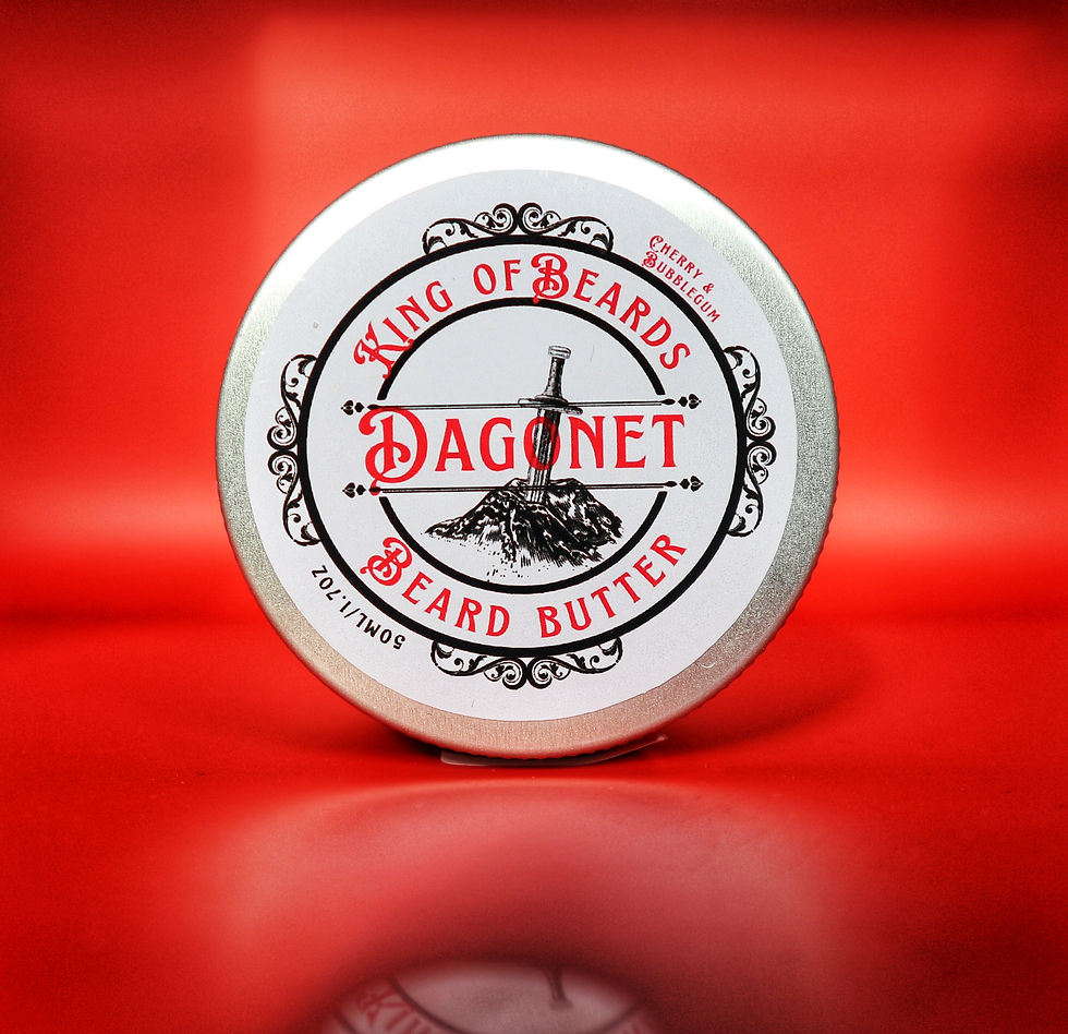 King of Beards Dagonet Beard Butter tin with red text and sword logo on a rich red background.
