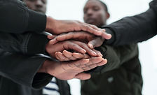 Standard_Group-of-Young-Black-Men-Joining-Hands2.jpg