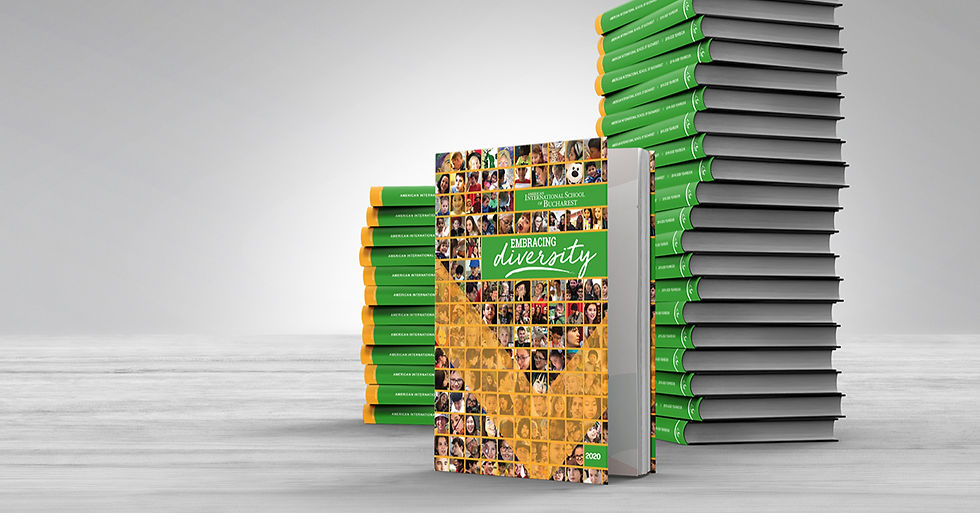 Stacked year books with a colorful cover titled "Embracing Diversity" featuring diverse faces. Set against a gray background, conveying inclusiveness.