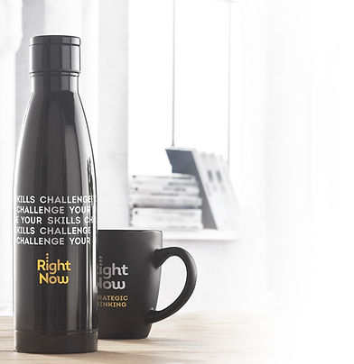 bold branding on black bottle and mug