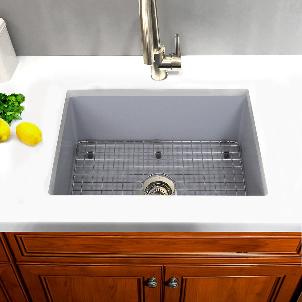 Installed overhead view Highpoint Collection Matte Gray Fireclay Sink and Grid in wood cabinet white countertop with lemons