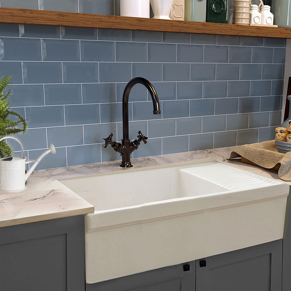 Thumbnail: White farmhouse sink with built in drainboard installed kitchen with blue tiles