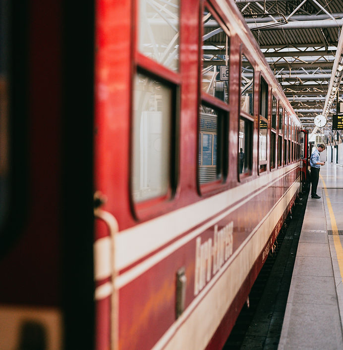 Passenger train traveling on railway tracks