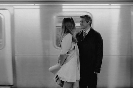 Black and white wedding couple portrait NYC subway platform