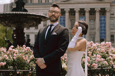 Wedding couple portrait fountain pink roses Brooklyn New York City