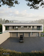 Wohnhaus mit Flachdach, Garage und klarer Fassadengestaltung
