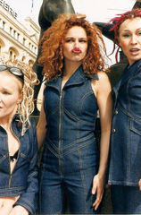 Three ladies wearing blue denim outfits