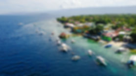 aerial-view-sandy-beach-with-tourists-swimming-beautiful-clear-sea-water-sumilon-island-be