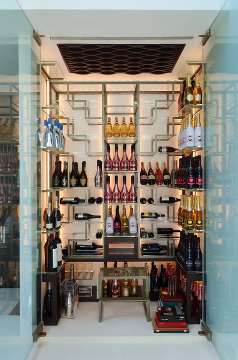 Celebrity wine cellar DJ Khaled Miami - right wing wine racks, full bottle display, luxury design, Dragon Cellars