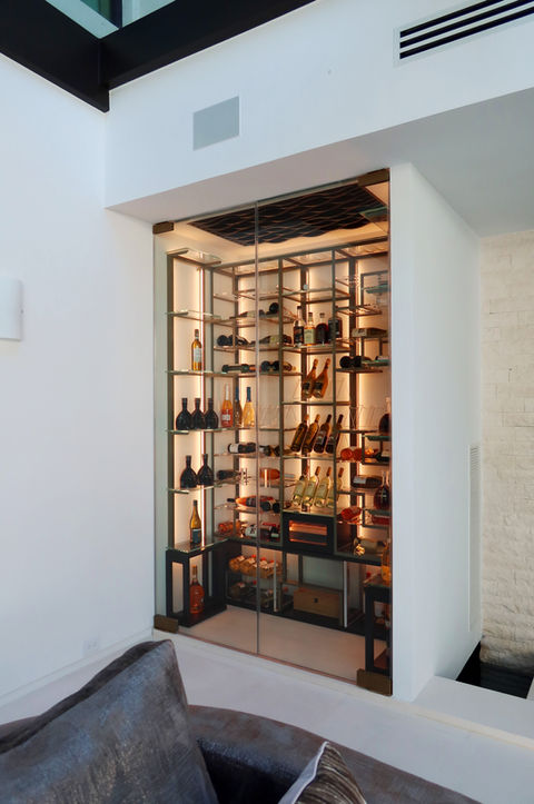 Celebrity wine cellar DJ Khaled Miami - floor-to-ceiling wine racks, custom storage, luxury home, Dragon Cellars