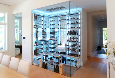 modern wine room Coconut Point Stuart Florida, wood and metal wine racks, warm contemporary wine storage, custom wine cellar, Dragon Cellars