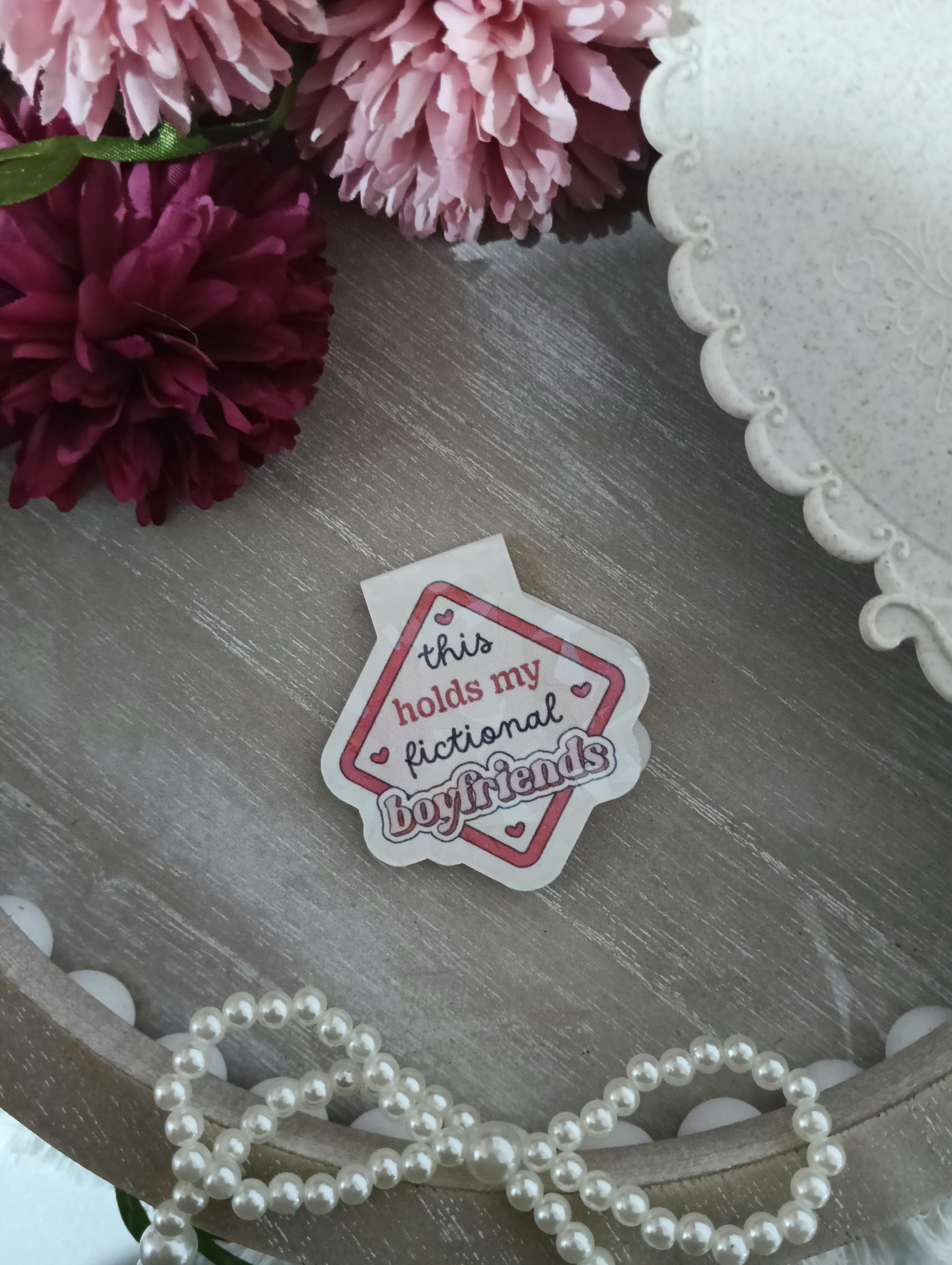 This holds my fictional boyfriends holographic magnetic bookmark