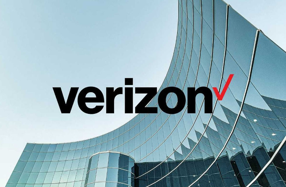 Curved glass building with mirrored windows against a clear sky. "Verizon" logo in bold black with a red checkmark.