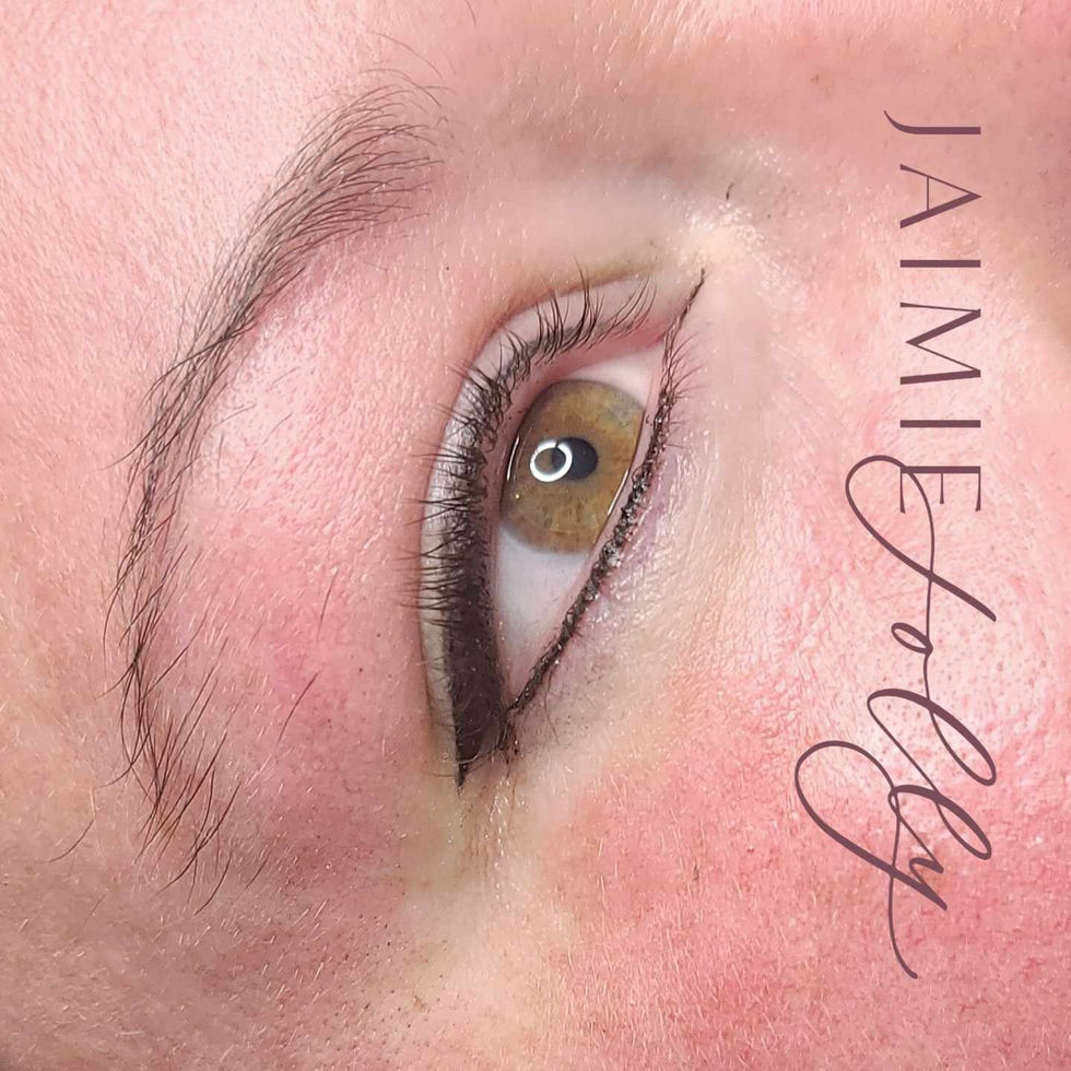 a close up of a woman 's eye by jamie avery