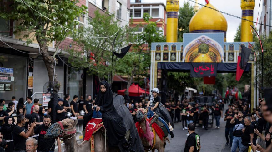 Shiite Muslims in Tehran participate in Ashoura processions, honoring the martyrdom of Hussein with traditional rituals and solemn observances.