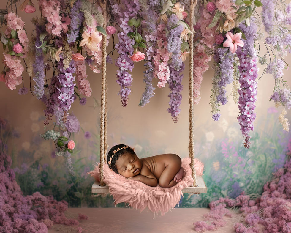 newborn baby in floral setup during photo shoot in tampa