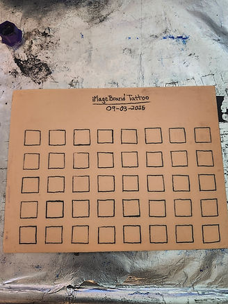 Current tattoo practice pad—clean linework and shading examples on synthetic skin