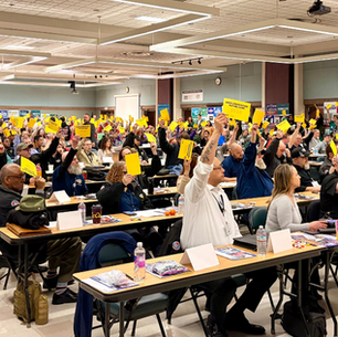 Delegates voting at COPE 2026