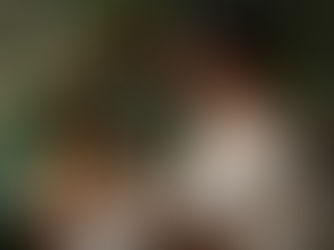 Natural beauty portrait of a confident woman smiling with glowing skin in sunlight