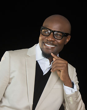Biodun white suite.jpg