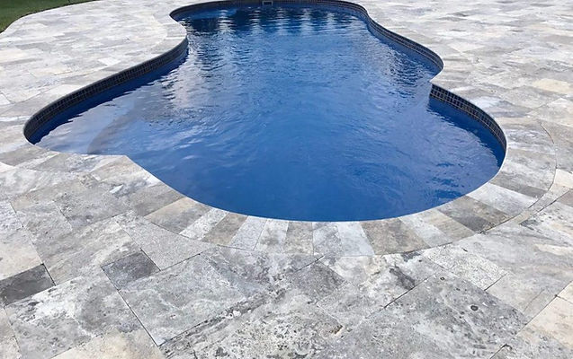 Silver Travertine Tumbled Pavers pool deck.jpeg