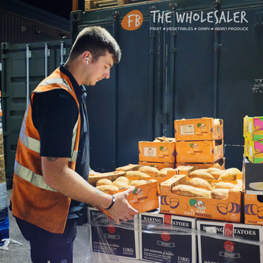 Tyler checking quality of produce