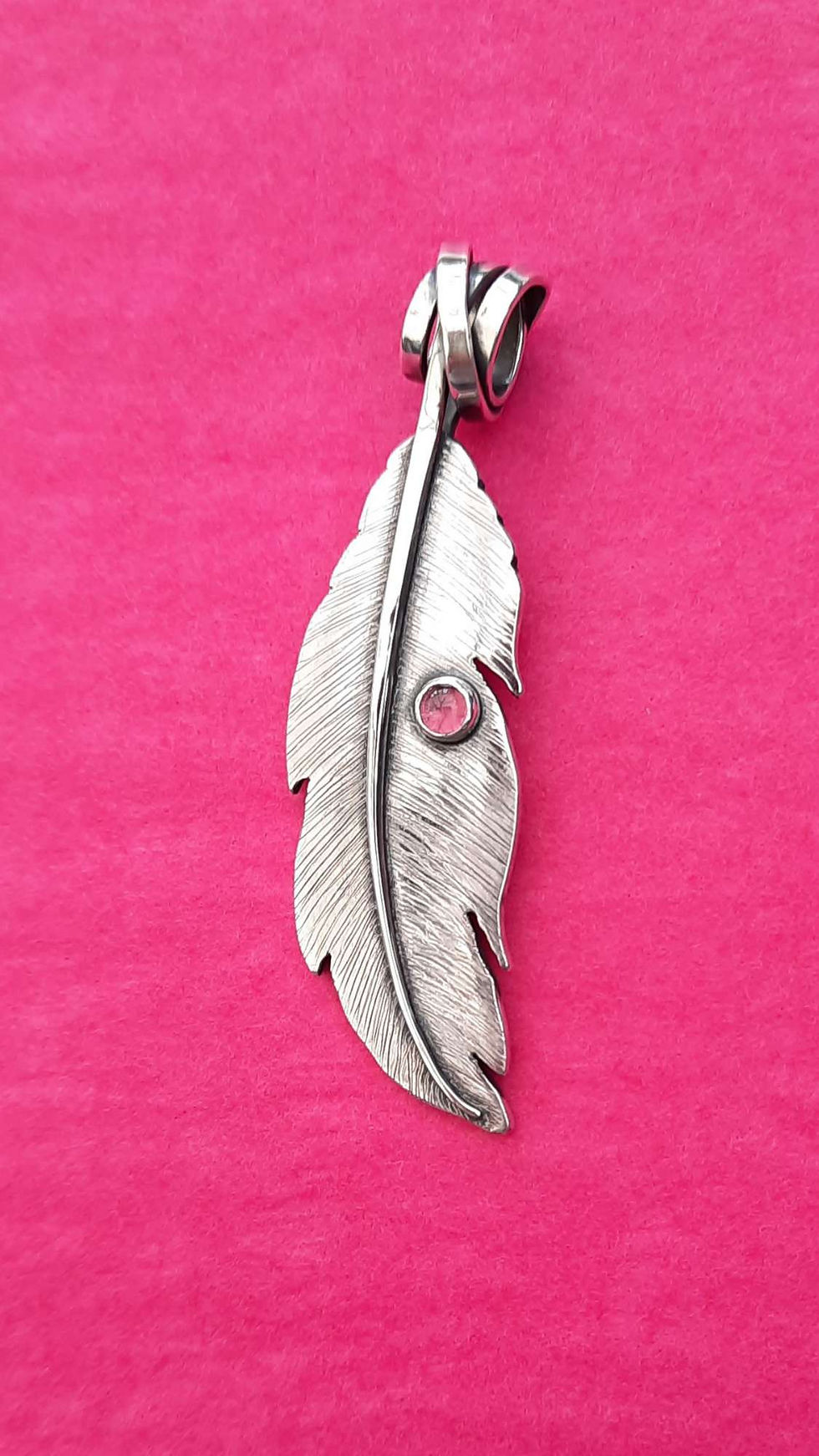 Silver feather pendant with Rhodolite Garnet