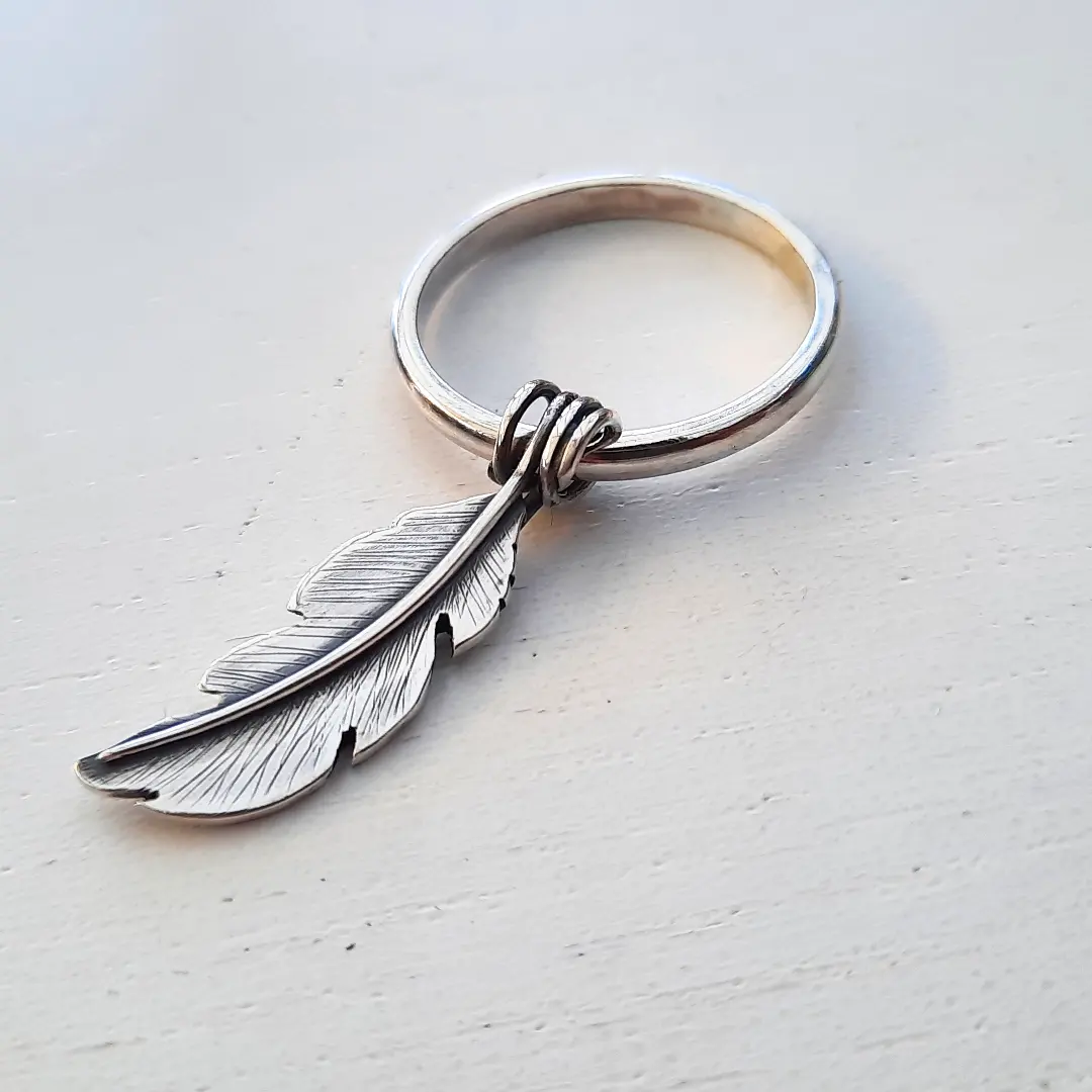 Hanging silver feather ring