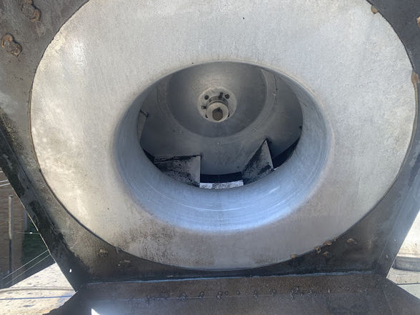 Underside of an upblast exhaust fan