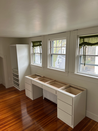 A custom vanity with drawers built by Elite Renovation LLC Rhode Island