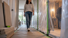 Homeowner navigating an occupied renovation access route