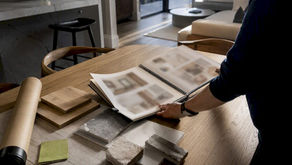 Homeowner arranging renovation material samples