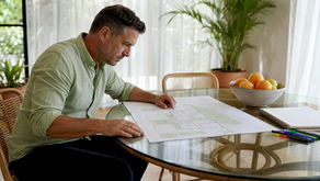 Man reviewing dual occupancy build site plan