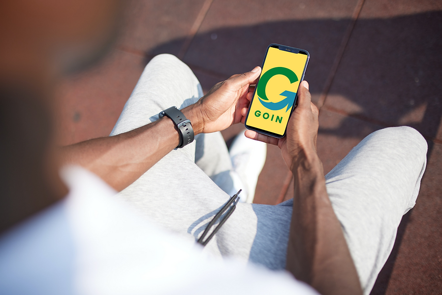 African-American man using iPhone 12 Pro_Goin (1) (1).png