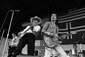 Ely on stage with The Clash