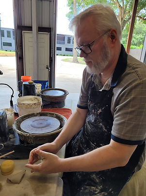 Learn how to throw a pot on the wheel!