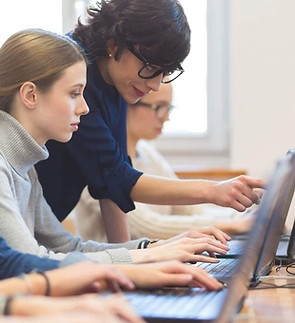 female-students-learning-computer-programming-picture-id542111792-1.jpg