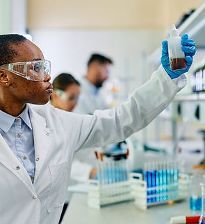 black-female-pharmaceutical-scientist-working-in-l-2023-05-26-00-18-19-utc-scaled.jpg