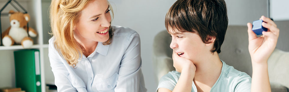 A young boy and woman talk