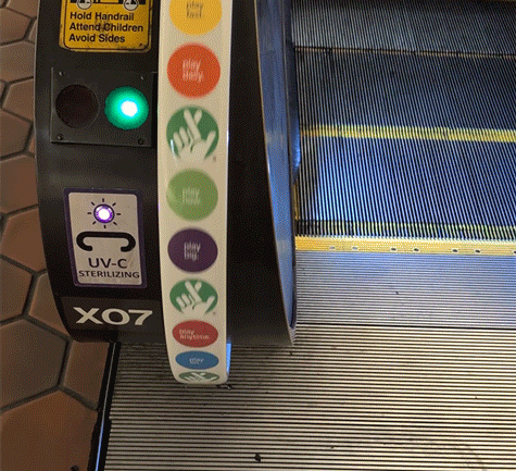 gif of escalator handrail with virginia lottery branding