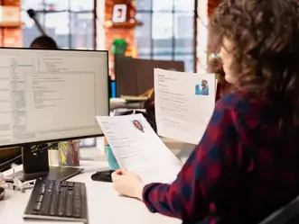 woman reading a strong resume